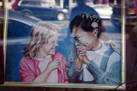 Two girls laughing together