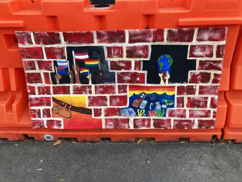 Painting of brick wall with eco-vignettes by Studio on the Common