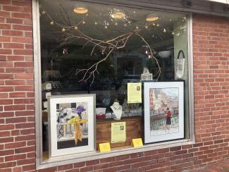 Art in August artworks in shop window