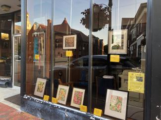 Art in August artworks in shop window